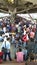 A crowded platform of New Delhi Railway station, People Waiting for their train