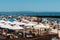 Crowded sandy Tamariz beach in Estoril near Lisbon, Portugal during the summer