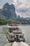 Crowds on a deck of a boat sailing on a Li River in China