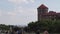 Crowds of international tourists passing by in courtyard of Wawel Royal Castle