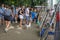 Crowds looking at painting in Paulista Avenue on Sunday afternoon.