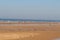 Crowds of people flock to Formby Beach, Liverpool during the current summer heatwave.