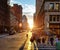 Crowds of people walk through an intersection on 5th Avenue in New York City