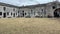 Crowds of tourists explore the interior courtyard of Castillo De San Marcos National Monument.