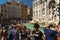 Crowds of tourists near famous Trevi fountain in Rome, Italy. Tourists are making selfie in front