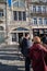 Crowds of tourists wait outside in line to visit the famous bookstore of Livraria Lello in