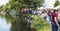 Crowds walking around Argyle Lake in Babylon Village durring the annual fair