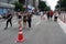 Crowds walking and looking at performances in Paulista Avenue on Sunday afternoon