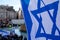 Crowds waving Israeli flags at pro-Israel rally in Trafalgar Square, central London, calling on Hamas to release the hostages.