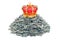 Crown on the heap of dollar packs, 3D rendering
