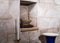 The crown lies on a pillow in a niche in the wall in the prayer hall in the cave in the Church of Saint Anne in the old city of Je