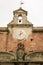 Crowned Crest Under Clock and Bell Tower