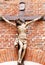 Crucifix on brick wall
