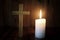 The Crucifix and Candle Light provide a light for Bible study, Christian religious concept, the crucifixion of faith and faith in