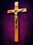 Crucifix with figure of Jesus on shades of purple