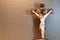 Crucifix image with Jesus Christ crucified on neutral background