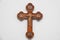 Crucifix of Jesus on the cross with stone background. Symbol of christian religion and belief. Image composed with copy space