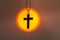 The crucifix in the middle of the sunrise or sunset. The concept of Christianity, a blessing from prayer to Jesus. Belief in God,