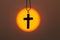 The crucifix in the middle of the sunrise or sunset. The concept of Christianity, a blessing from prayer to Jesus. Belief in God,