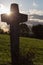 crucifix on a september evening sky in south germany rural area