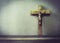 The crucifix on wooden background
