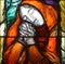 Crucifixion, detail of stained glass window in Saint James church in Sontbergen, Germany