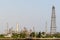 Crude oil refinery plant and many chimney at coast of river on sky afternoon  bright day at thailand with copy space