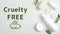 Cruelty free cosmetics set on green background