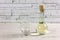 Cruet of White Wine and Empty Glass on a Wooden Table