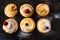 Cruffin - Buns from yeast dough. Dark graunge background. Mystical light. cinnamon craffin cinnabon mix of croissant and muffin