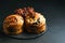 Cruffins with dried fruits, chocolate and black currants