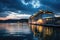 Cruise liner docked at city waterfront at night