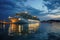 Cruise liner docked at city waterfront at night