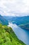 The cruise liners at the end of Geirangerfjord, near small village of Geiranger. View from Eagles Road.  Norway