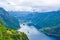 The cruise liners at the end of Geirangerfjord, near small village of Geiranger. View from Eagles Road. Norway