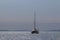 A cruise sailing catamaran lagoon 450 with a Bermuda sloop-type rig goes past the islands of the Croatian Riviera on a sunny summ