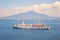 Cruise Sailship on anchor with mount Vesuvius on the backround