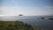 Cruise ship approaching Grimsey Island with many arctic birds flying in Grimsey Island Iceland