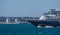 Cruise ship Azamara Pursuit steams through the waves out of Cadiz port.