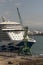 Cruise ship on berth with a background of fuel tanks. Le Havre, France.