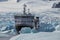 A Cruise Ship Among Chunks of Ice in Antarctica