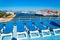 Cruise ship deck sunbeds and Piraeus port Athens urban area Greece
