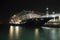 Cruise ship docked at ocean terminal at night