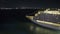 Cruise ship docked on the pier at Puerto Rico destination at night