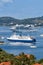 Cruise ship, ferry and boats portrait format in the Mediterranean Sea Aegean island of Skiathos, Greece