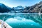 Cruise ship in Glacier Bay cruising towards Johns Hopkins Glacier in Alaska, USA. Panoramic view during summer