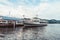 Cruise ship on lake Lucerne docking close to harbour overcast day