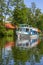 Cruise ship leaving the Lock water navigation Guzianka on Masurian lakes, Masuria, Poland