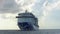Cruise ship in the ocean. Cruise liner sailing the ocean or sea on a sunny day. Travel on luxury large cruise ship