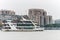 Cruise ship sailing on the Huangpu River, the bund of Shanghai, view from Pudong